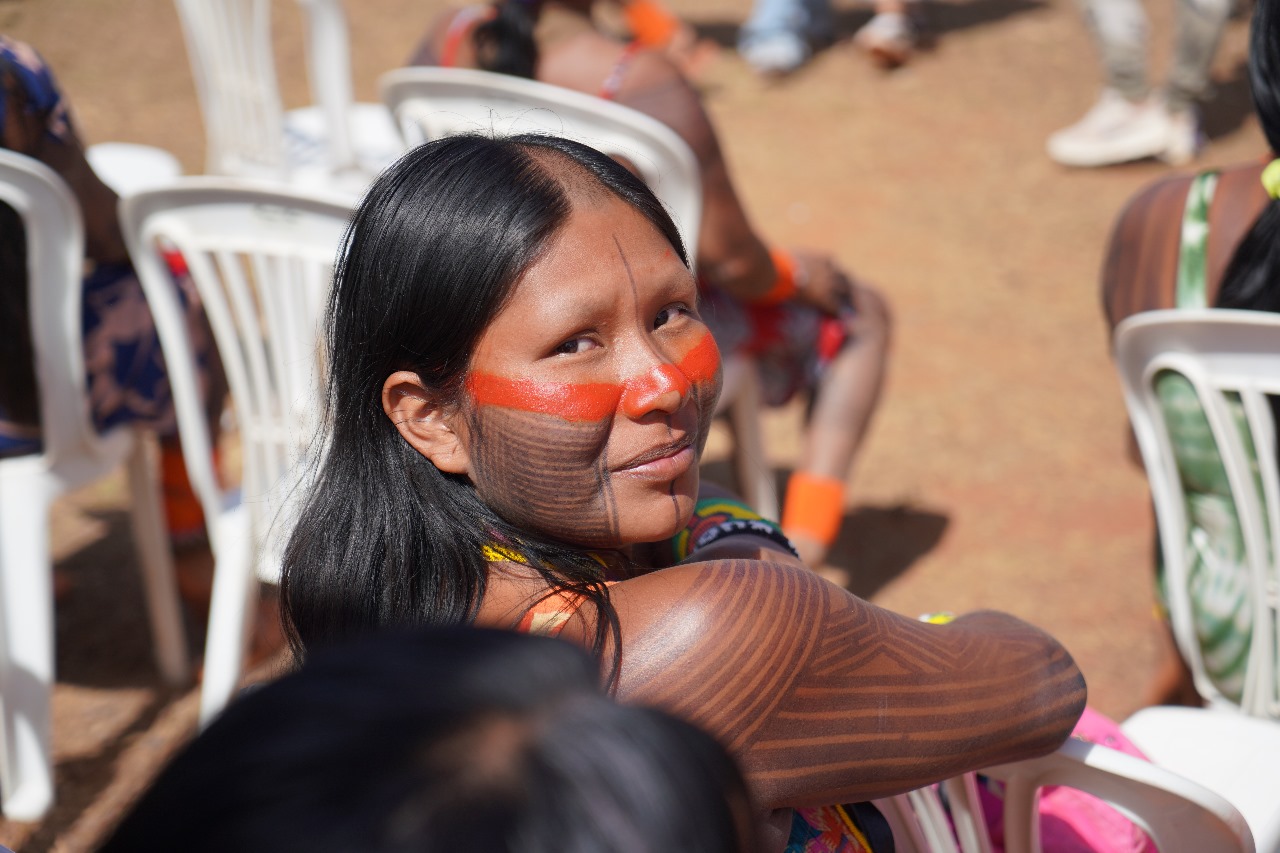 Kayapó women in ceremonial headdresses joining the march in Brasília