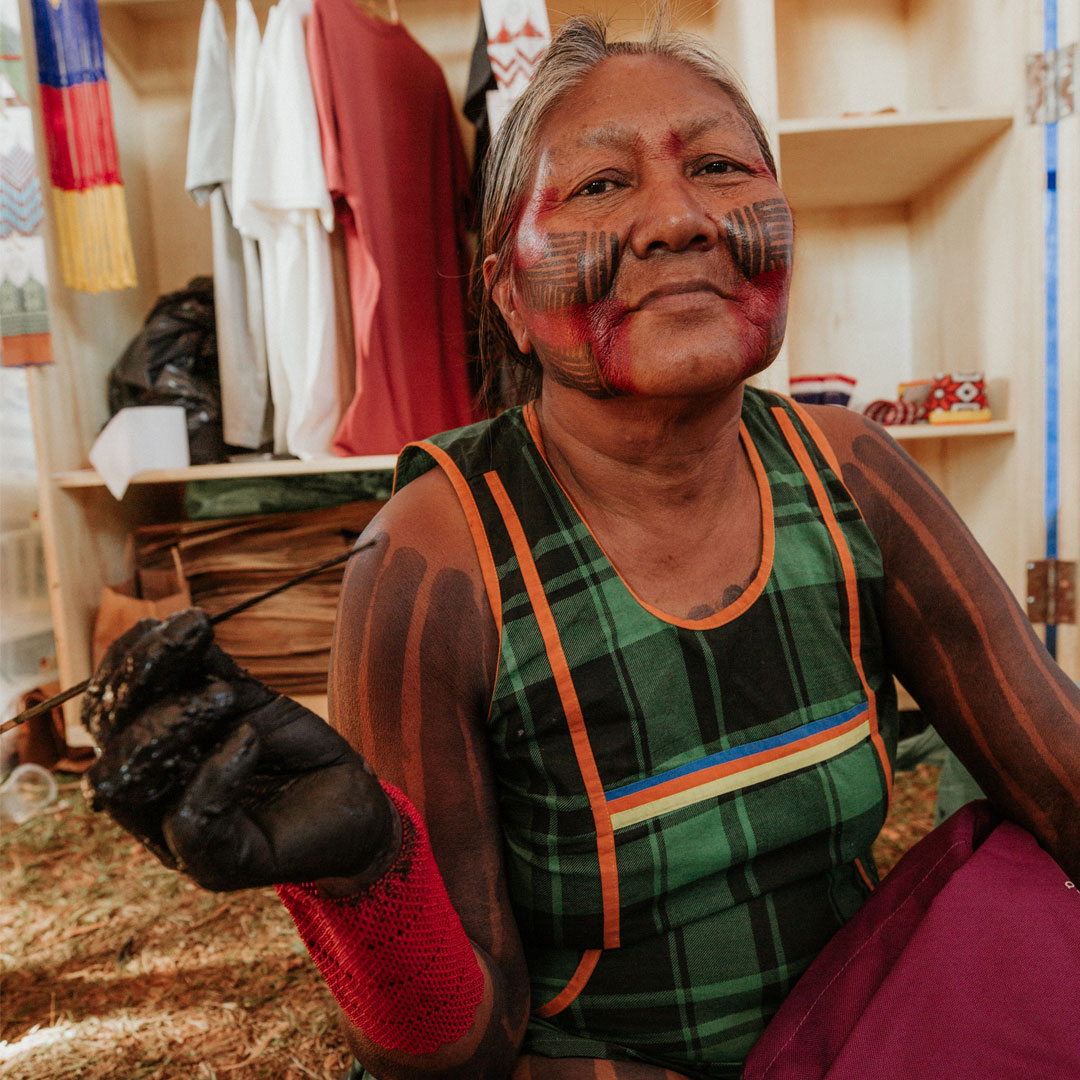 Tuíre Kayapó at a community gathering in Mẽbêngôkre territory